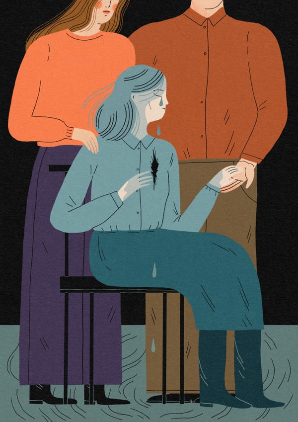 An illustration of a woman crying with a rip in her shirt where her heart is. Two people behind her hold her hand and shoulder.